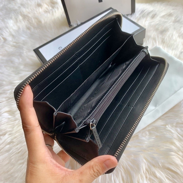 G*u*i leather zip around wallet