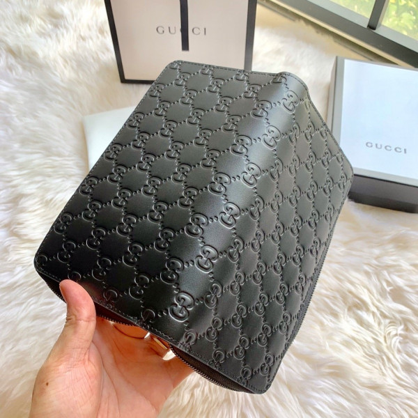 G*u*i leather zip around wallet