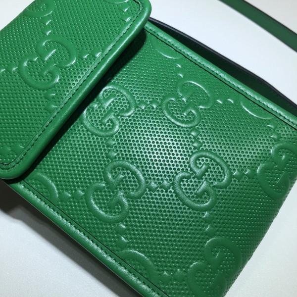 G*u*i gg embossed mini bag