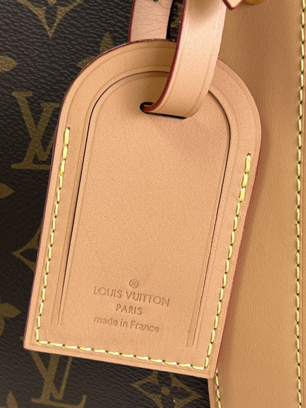 l0*is V*t0n carryall