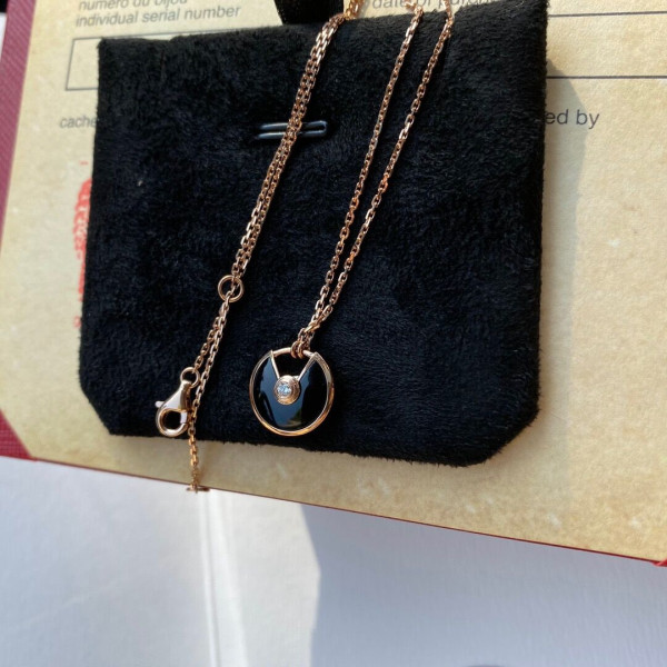 Ca*t*er amulet necklace