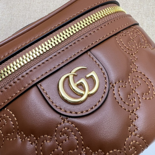 G*u*i gg matelassé top handle mini bag