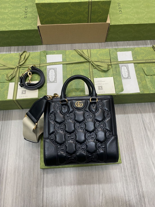 G*u*i gg matelassé mini top handle bag