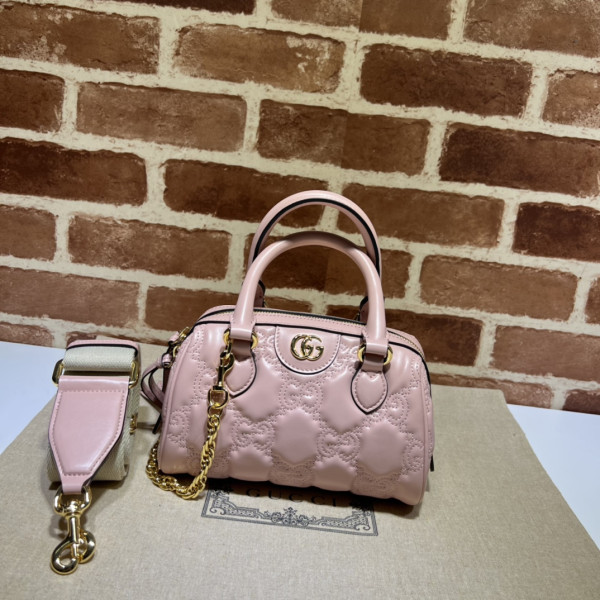 G*u*i gg matelassé leather top handle bag