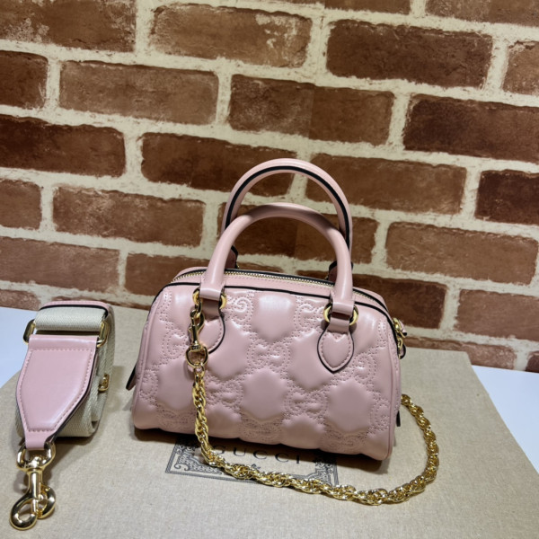 G*u*i gg matelassé leather top handle bag