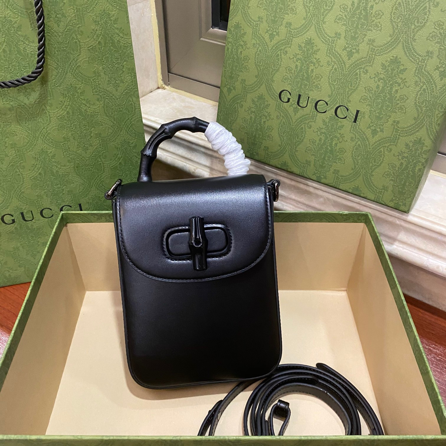 G*u*i bamboo mini handbag
