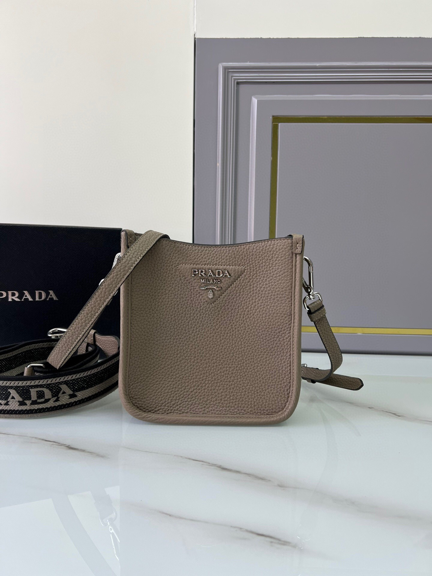 Pra*a leather mini shoulder bag