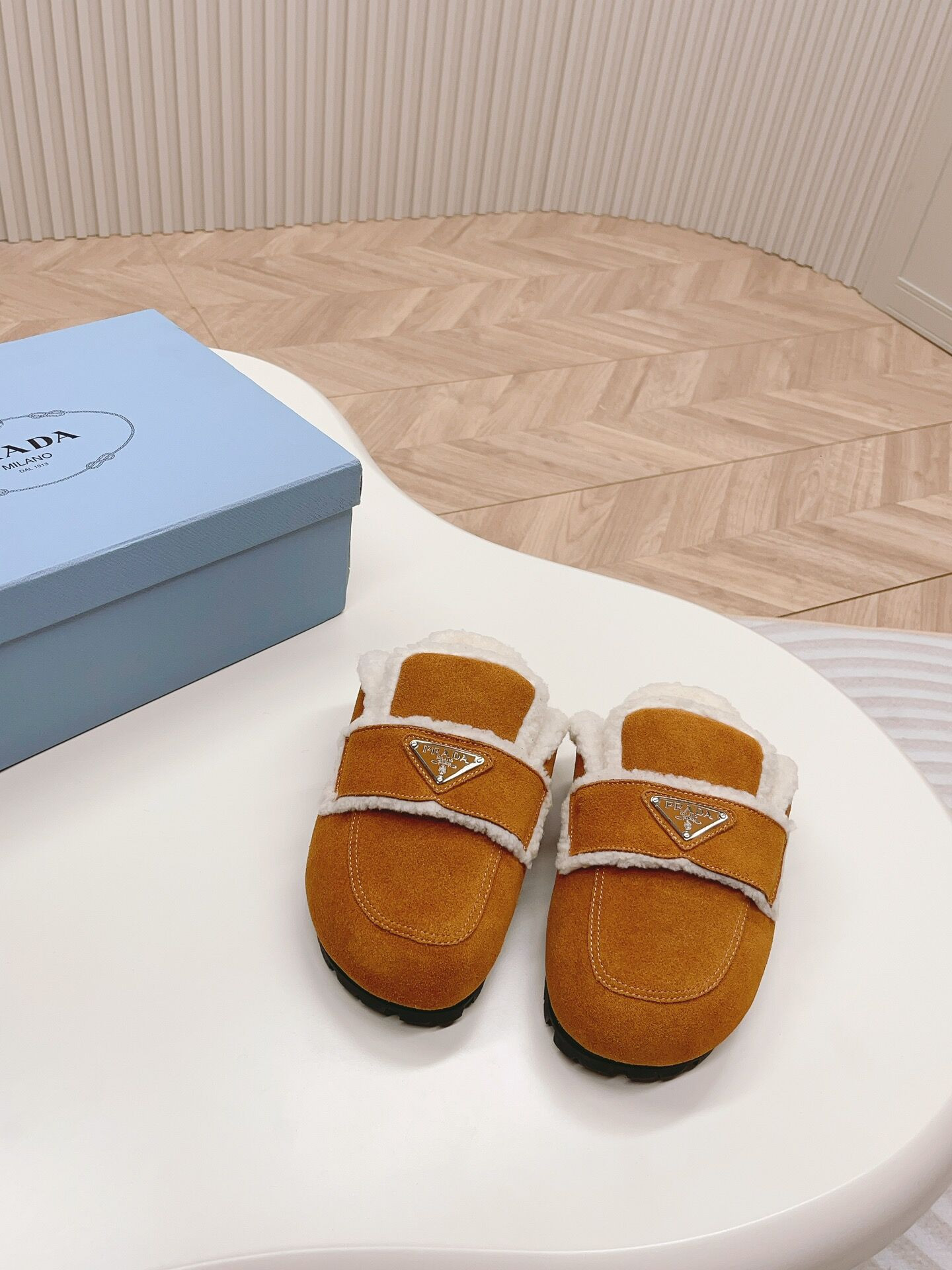 Pra*a shearling slippers