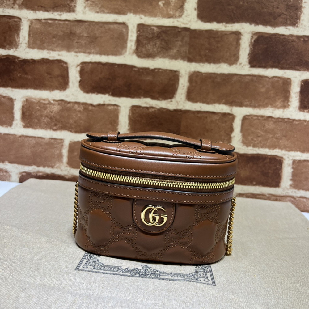 G*u*i gg matelassé top handle mini bag
