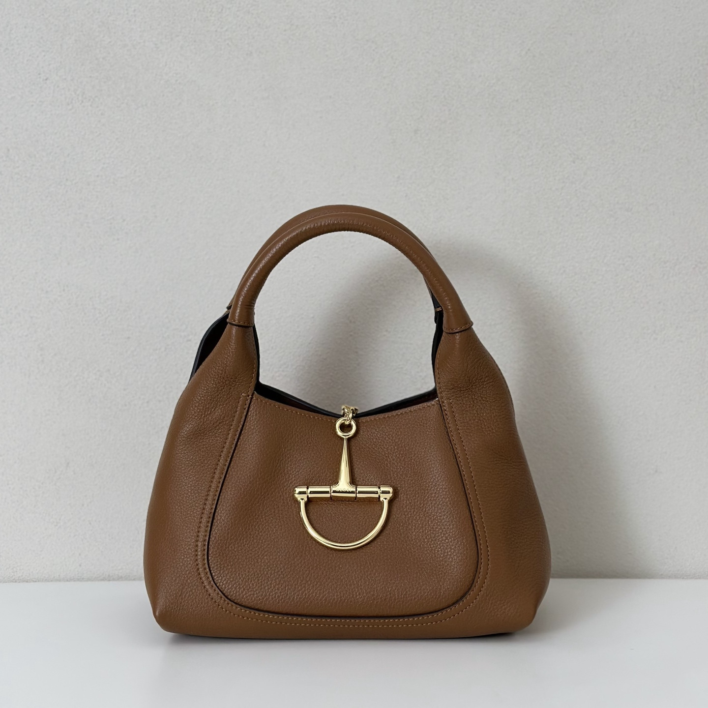 G*u*i softbit medium top handle bag
