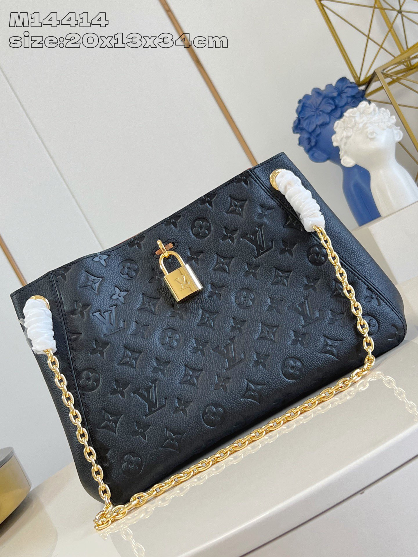 l0*is V*t0n anytime pm - 20*13*34cm
